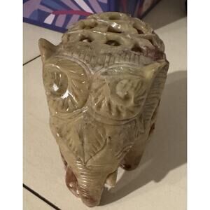 Vintage Jadeite elephant figurine, featuring a baby elephant inside